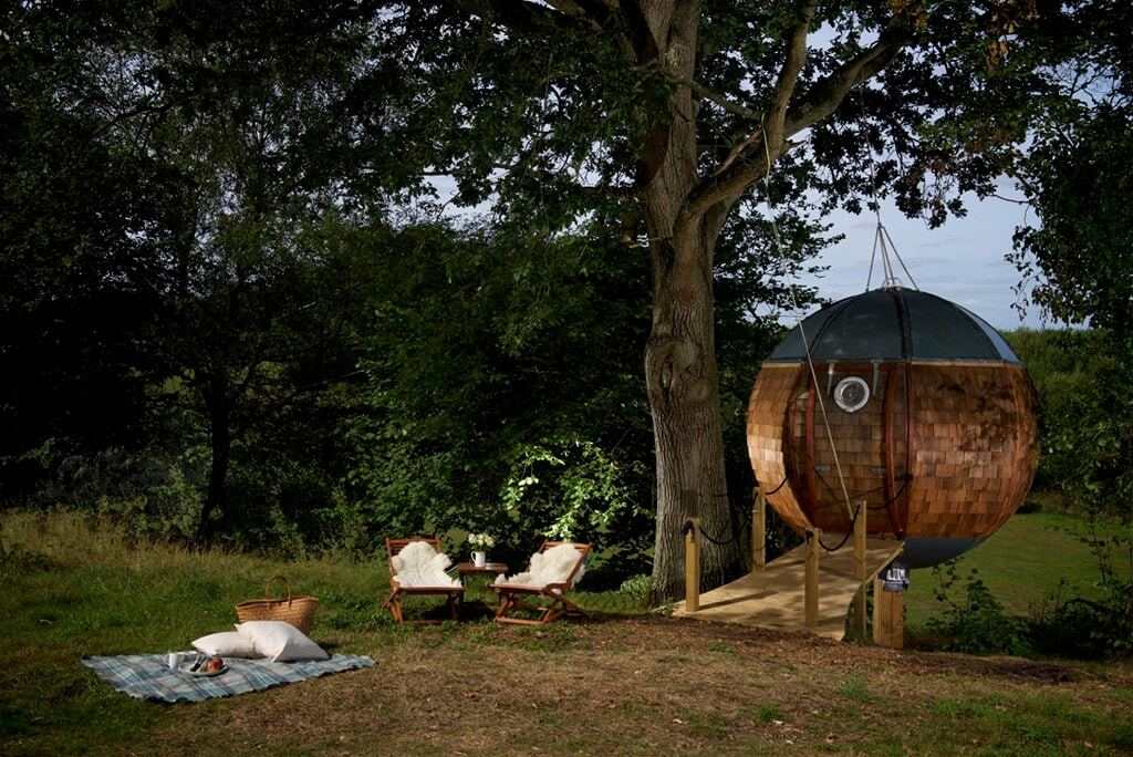 floating-tree-sphere-in-evening-glamping-dorset