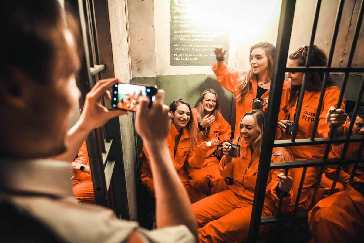 girls-in-cell-at-alcotraz-cocktail-bar-indoor-activities-brighton