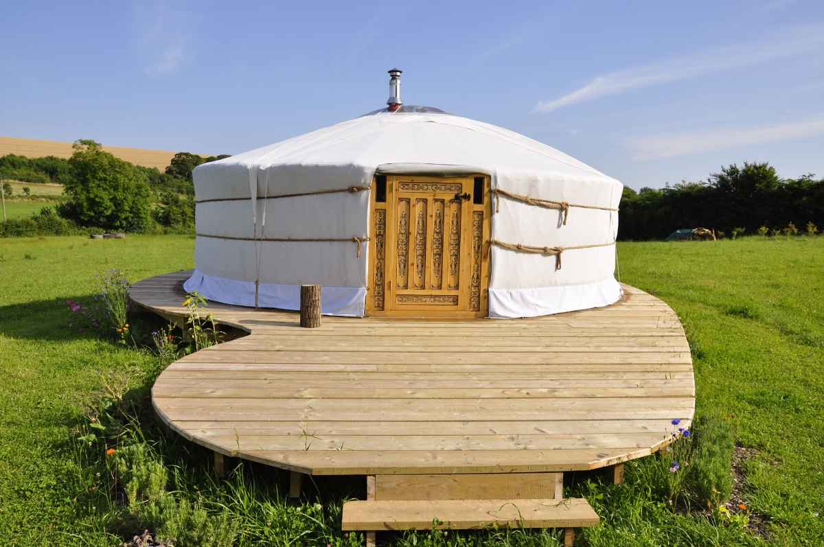 green-valley-yurt-on-decking-in-field-glamping-dorset