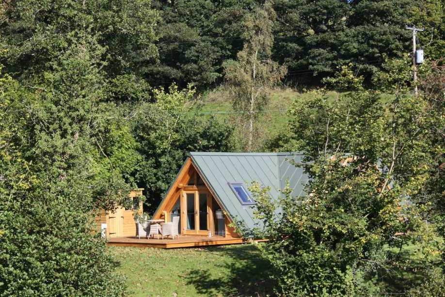 offas-pitch-cabin-with-outdoor-decking-in-field