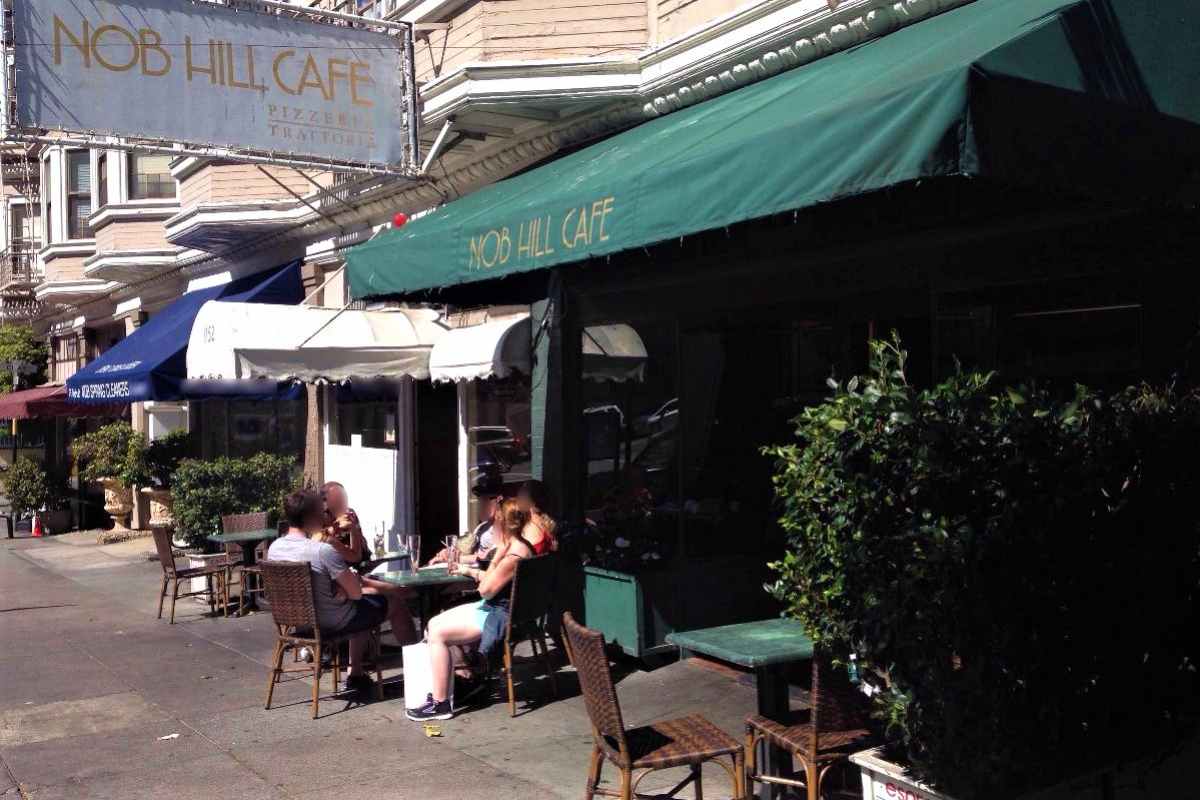 people-drinking-outside-of-nob-hill-cafe-on-sunny-day