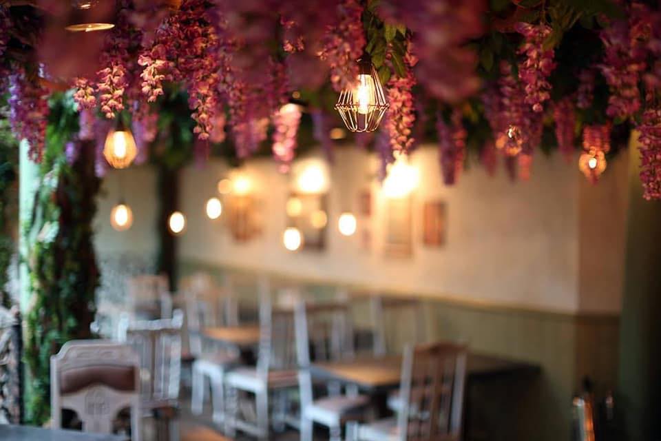 pink-flowers-at-the-entrance-to-the-botanist-bar