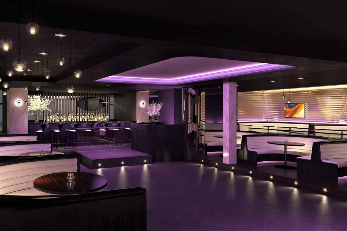 table-booths-in-purple-lights-at-faces-club-gants-hill