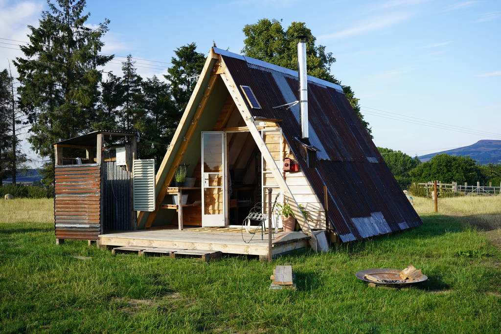 the-bivvy-cabin-with-outdoor-decking-in-field