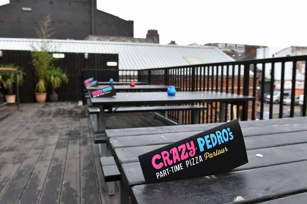 picnic-tables-on-terrace-at-crazy-pedros