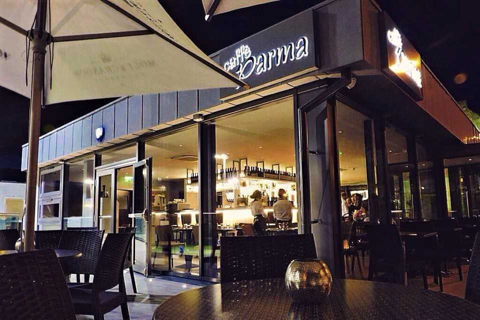 tables-outside-caffe-parma-restaurant-at-night