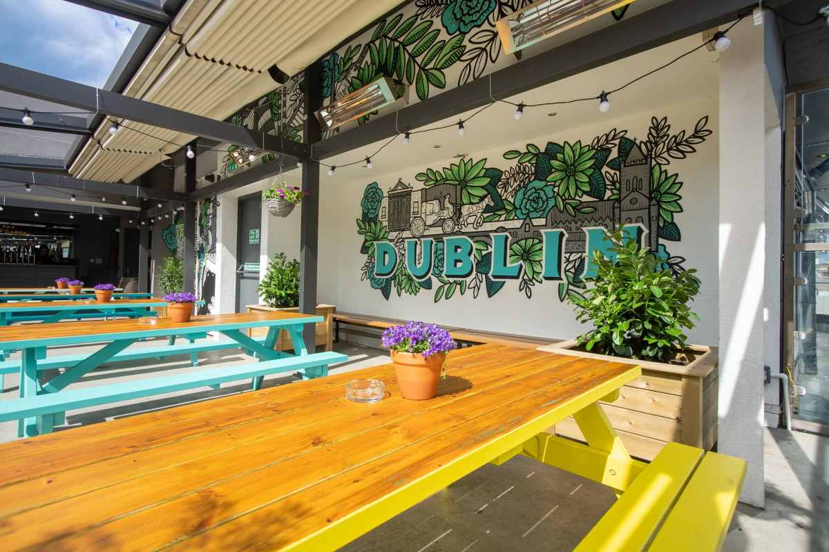 colourful-picnic-tables-in-fitzsimons-bar-rooftop-bars-dublin