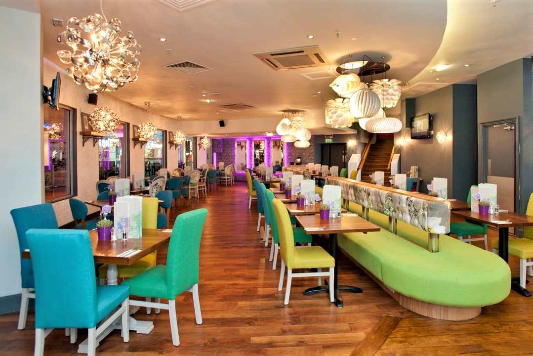 colourful-tables-and-chairs-in-slug-and-lettuce-bar