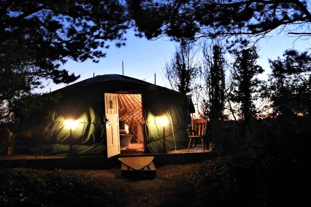 pearl-yurt-at-marina-yurts-lit-up-at-night