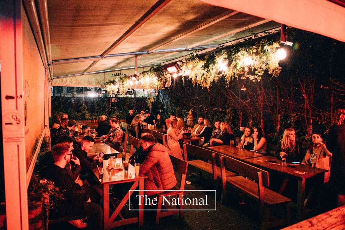 people-drinking-at-the-national-bar-at-night-rooftop-bars-belfast