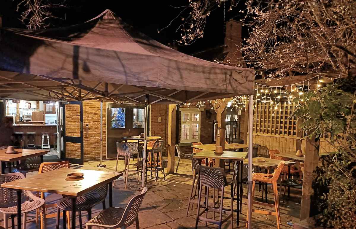 tables-in-the-cradock-arms-pub-garden-at-night