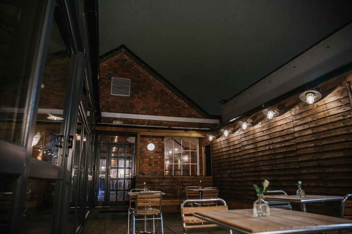 tables-on-brick-and-beam-terrace-at-night-rooftop-bars-leicester