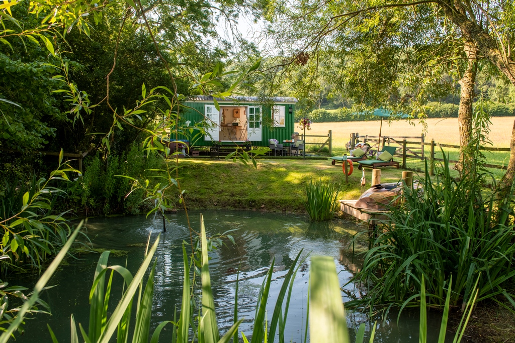ladys-well-shepherds-hut-with-pond-in-front