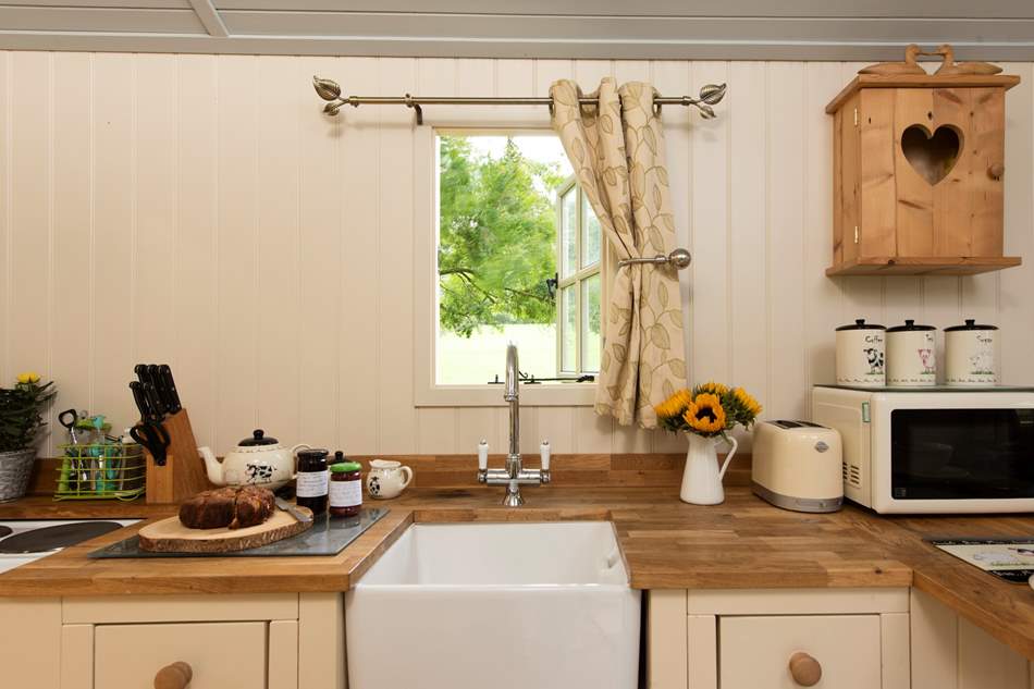 sink-and-microwave-in-kitchen-of-shepherds-hut