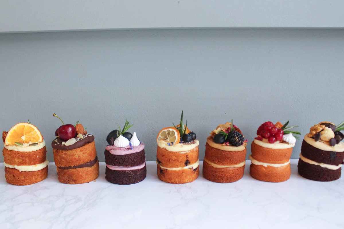 line-up-of-small-cakes-from-luminary-bakery