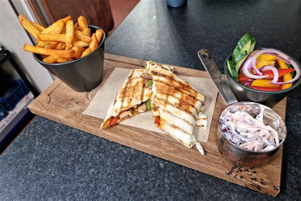 panini-and-chips-at-scotty’s-lounge-and-bistro