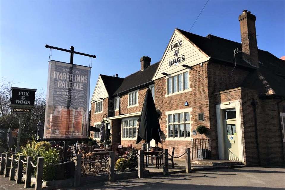 exterior-of-fox-and-dogs-pub-on-sunny-day
