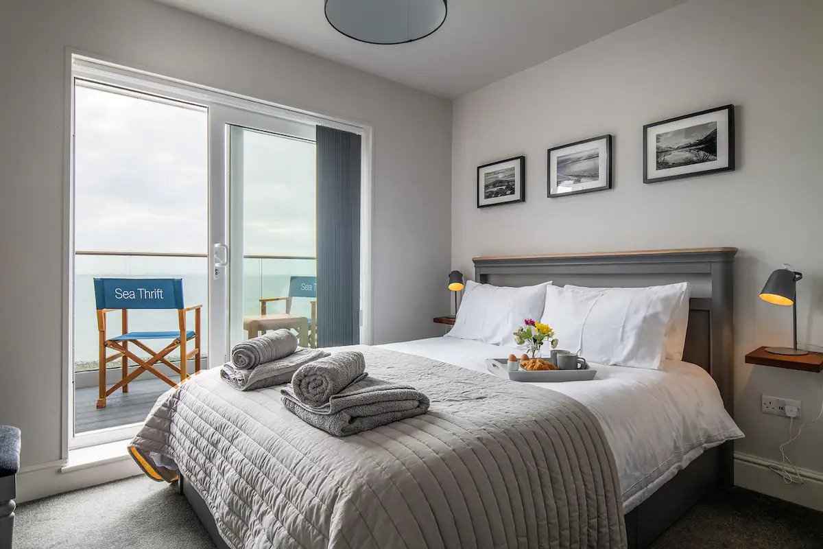 bedroom-with-balcony-inside-sea-thrift-beach-house