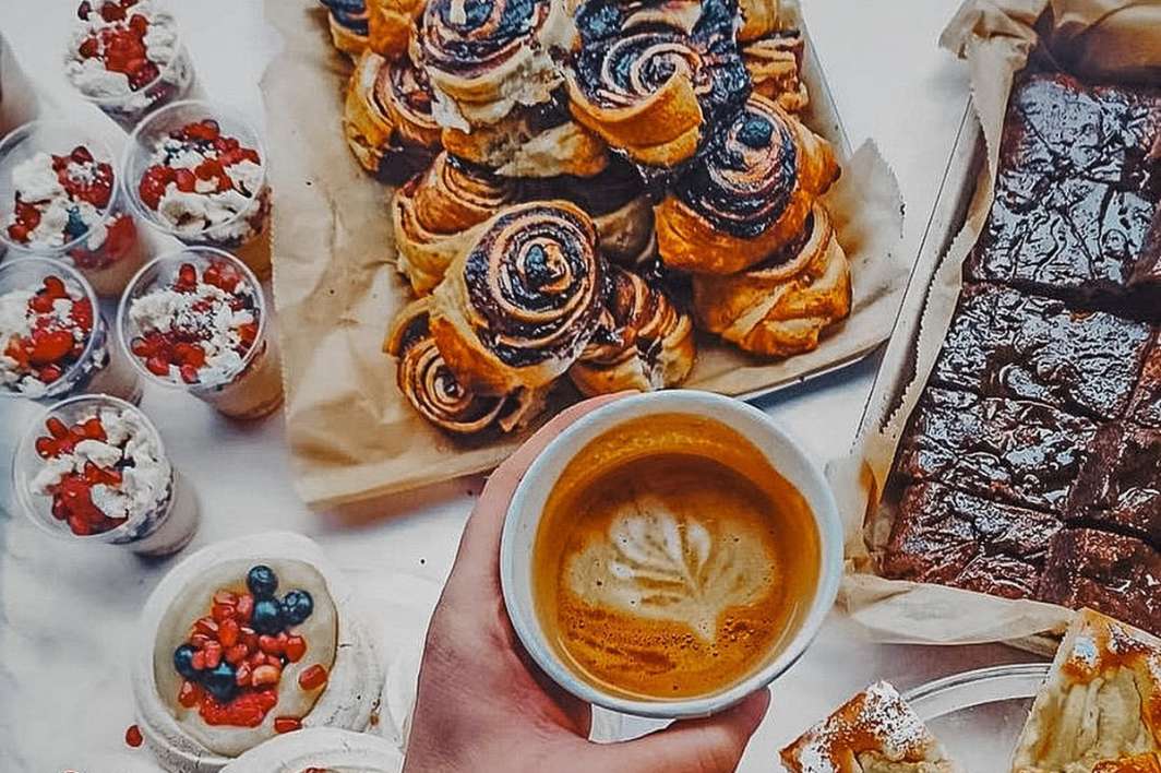 pastries-and-coffee-in-hand-the-sunny-spoon