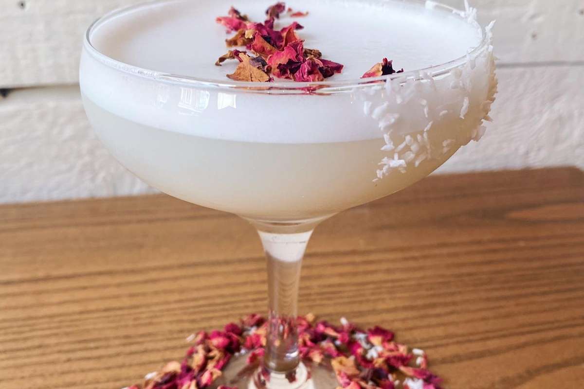 floral-cocktail-in-martini-glass-from-artigiano-espresso-and-wine-bar