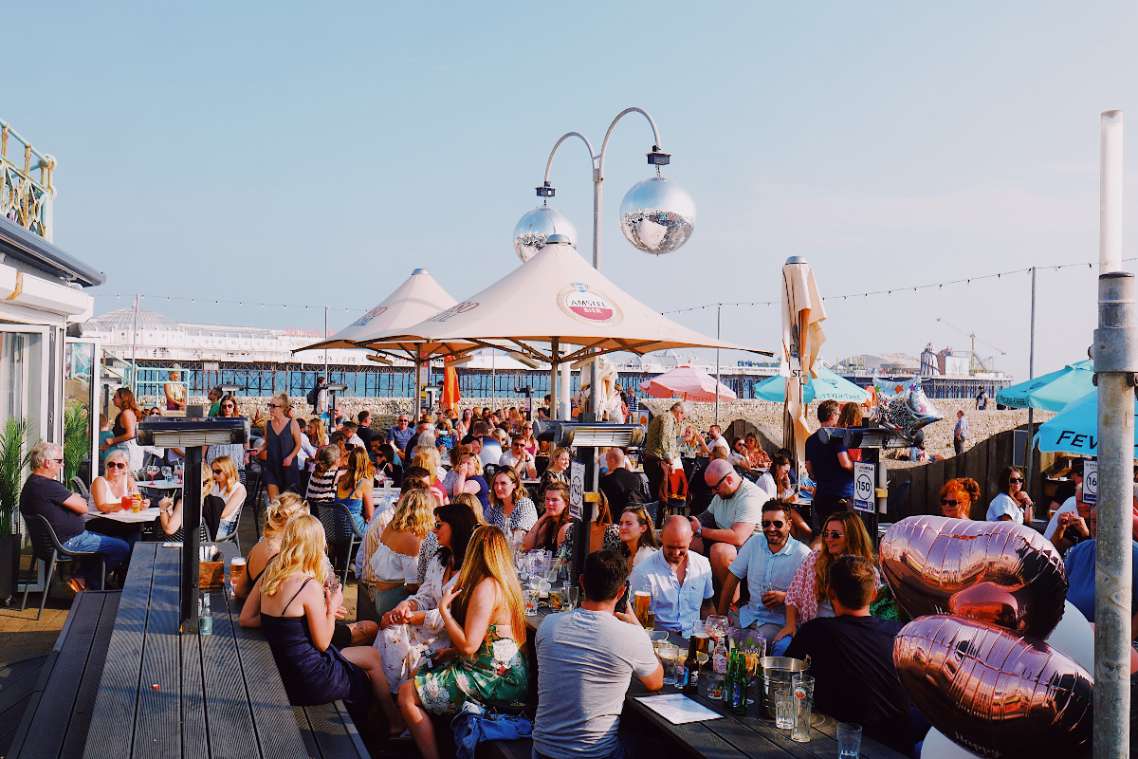busy-outdoor-terrace-at-ohso-social-beach-bar-and-restaurant