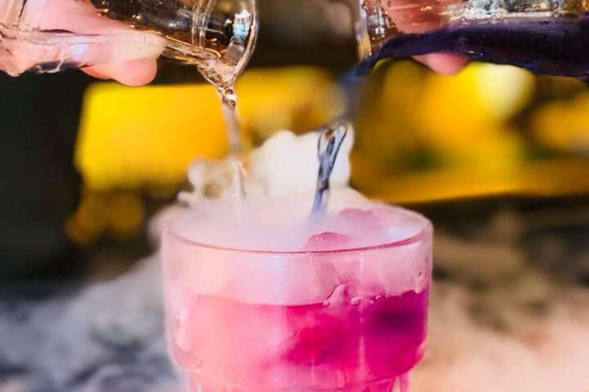 colour-changing-cocktail-being-poured-at-the-alchemist