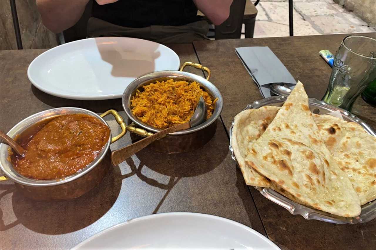 curry-rice-and-naan-bread-at-incredible-india-restaurant