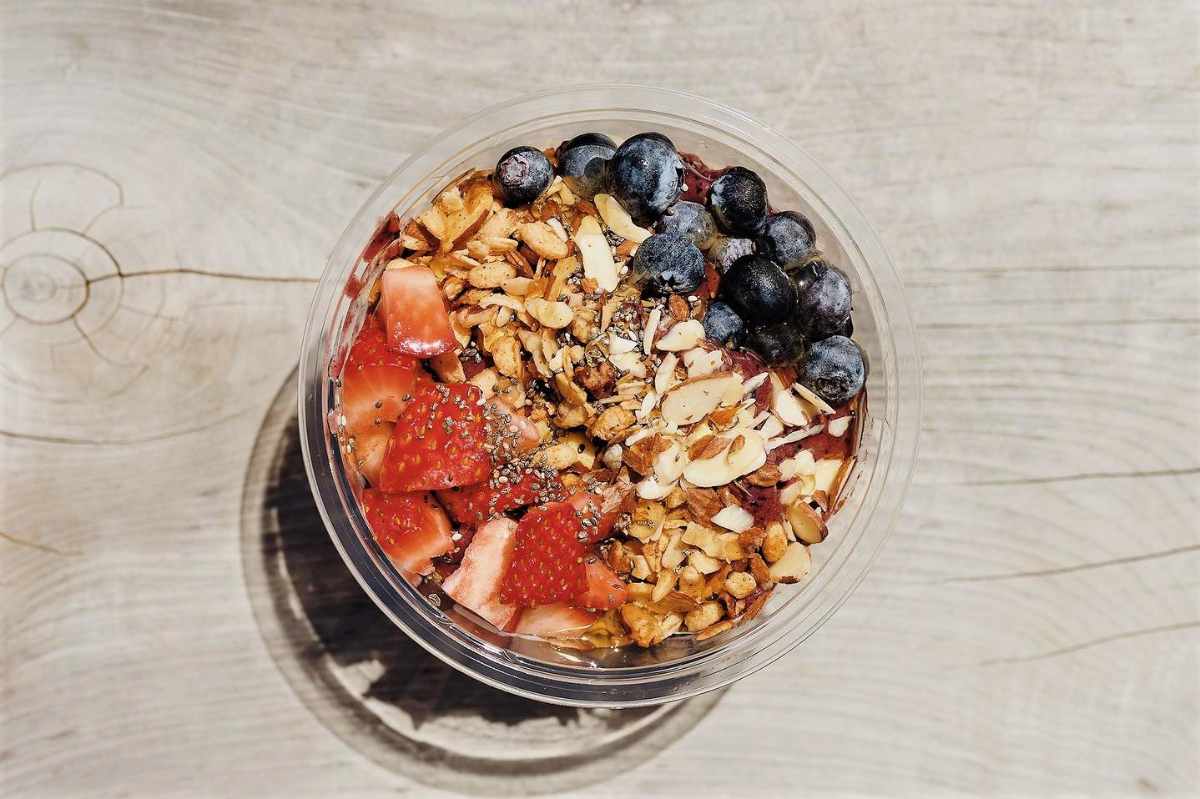 bowl-of-strawberries-granola-and-blueberries-from-civil-goat-coffee-co