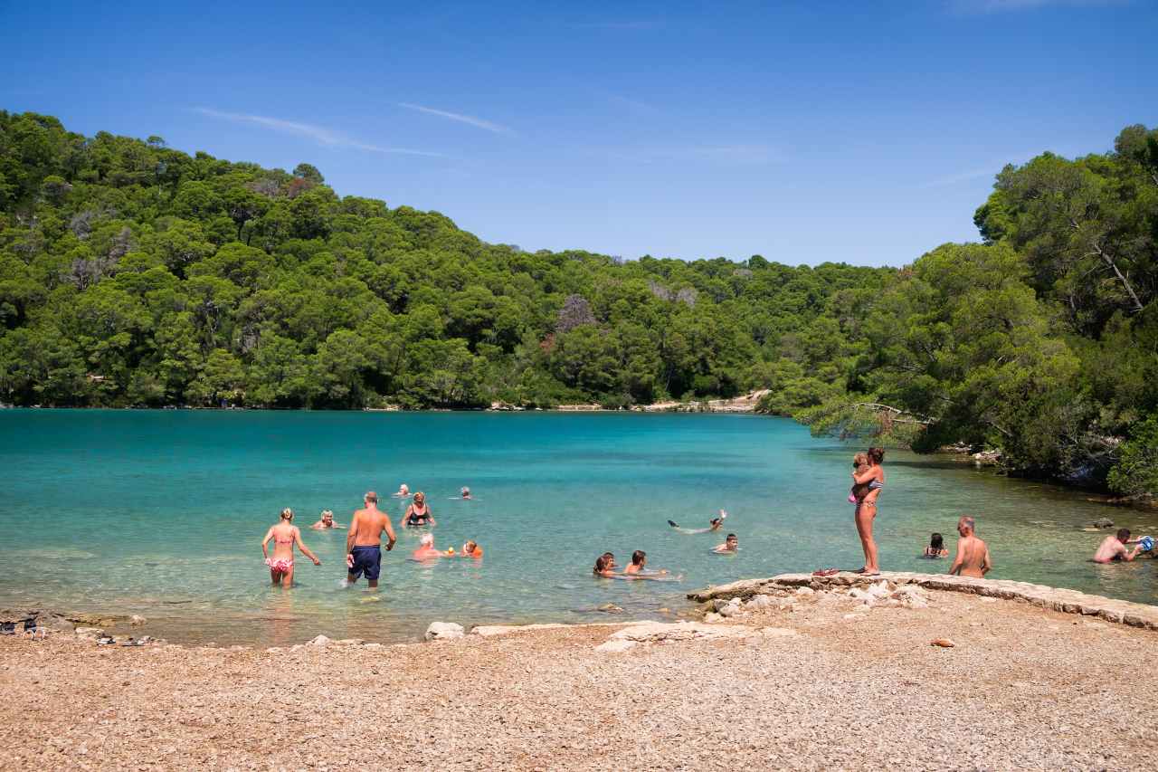 people-swimming-in-water-at-mljet-national-park