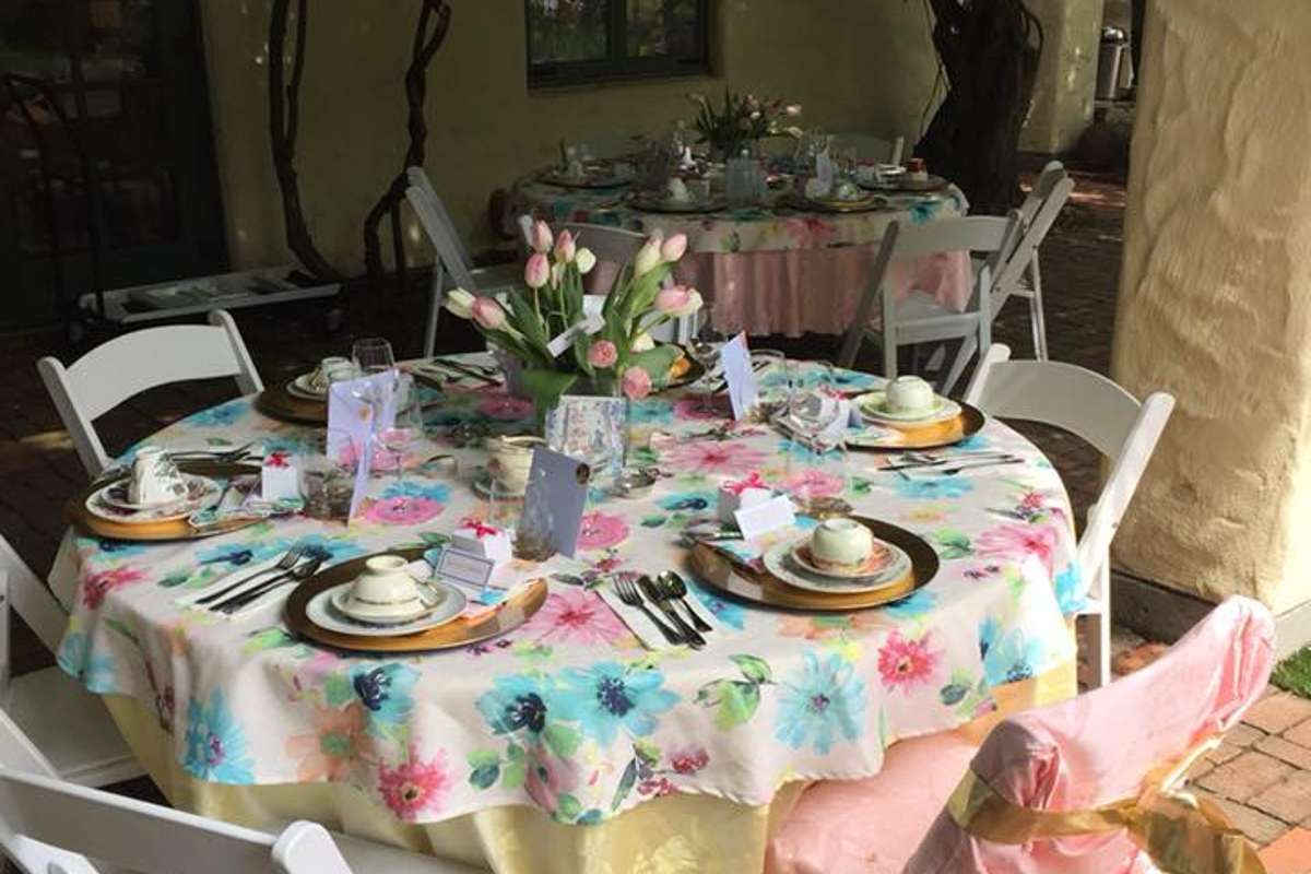 table-laid-for-afternoon-tea-in-the-garden-at-lovejoys-tea-room