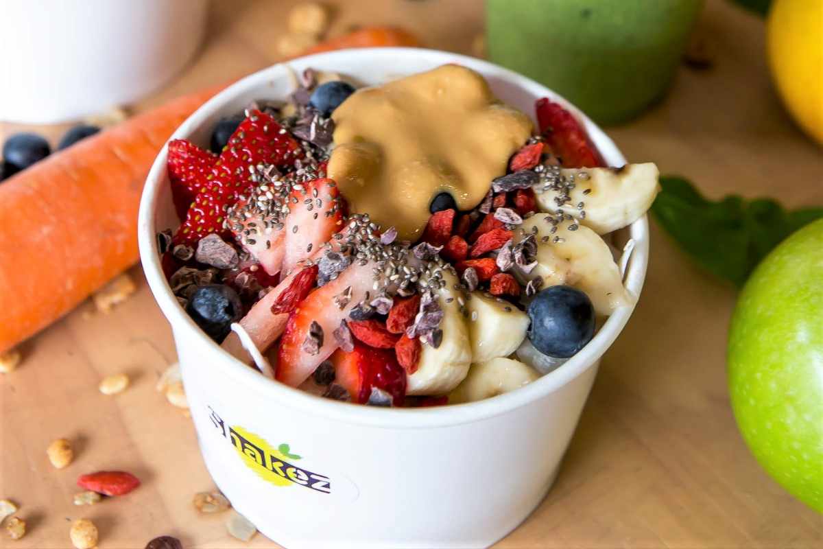 bowl-topped-with-fruit-and-peanut-butter-from-shakez