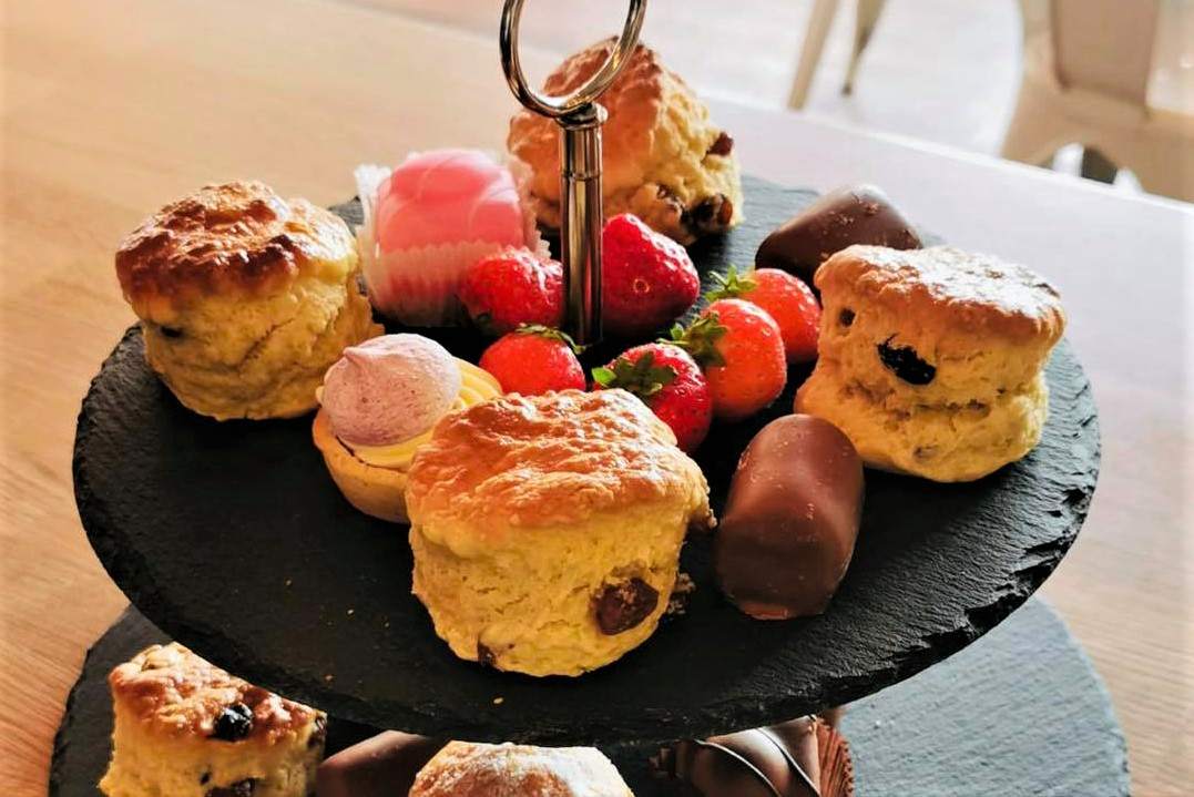 cakes-and-scones-on-tiered-stand-at-the-peloton-cafe