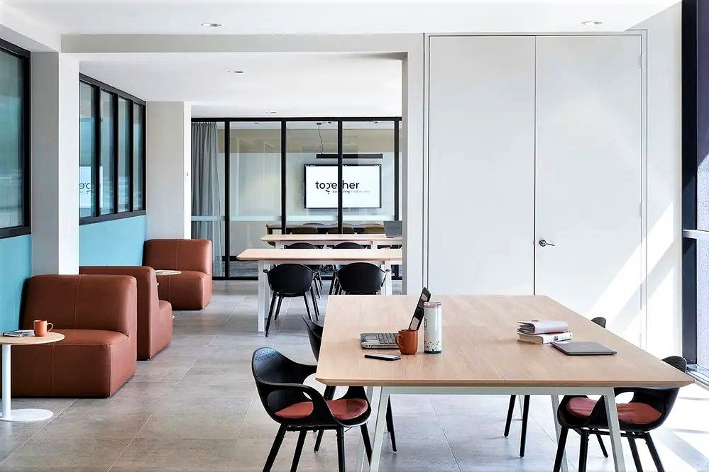 tables-and-seats-inside-together-co-living-in-daytime