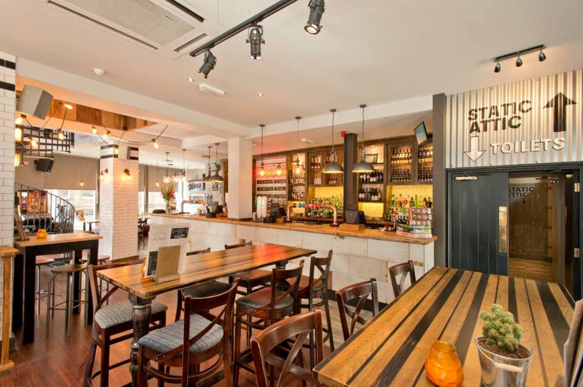 bar-and-restaurant-tables-inside-faradays-craft-pub
