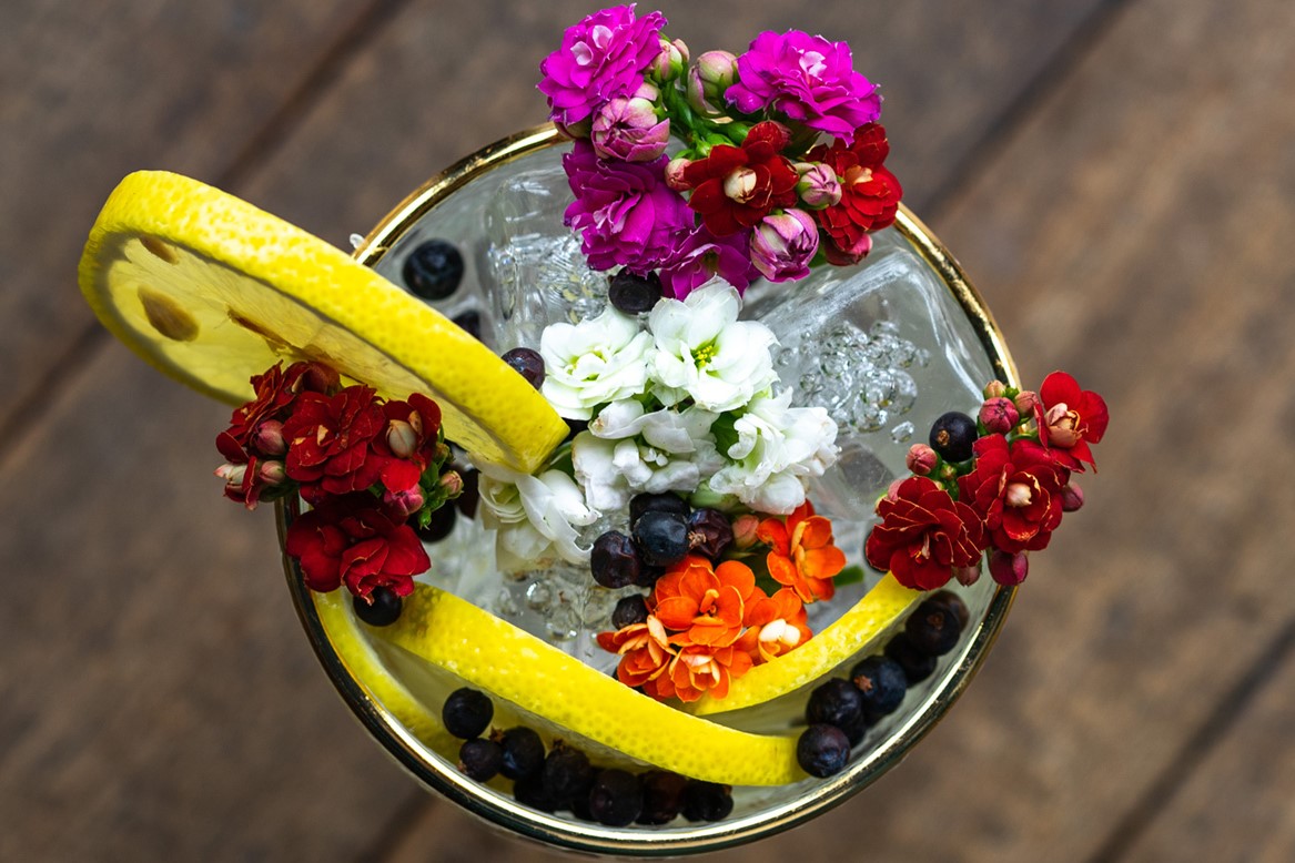 cocktail-topped-with-flowers-from-gin-and-juice-cocktail-bars-cardiff