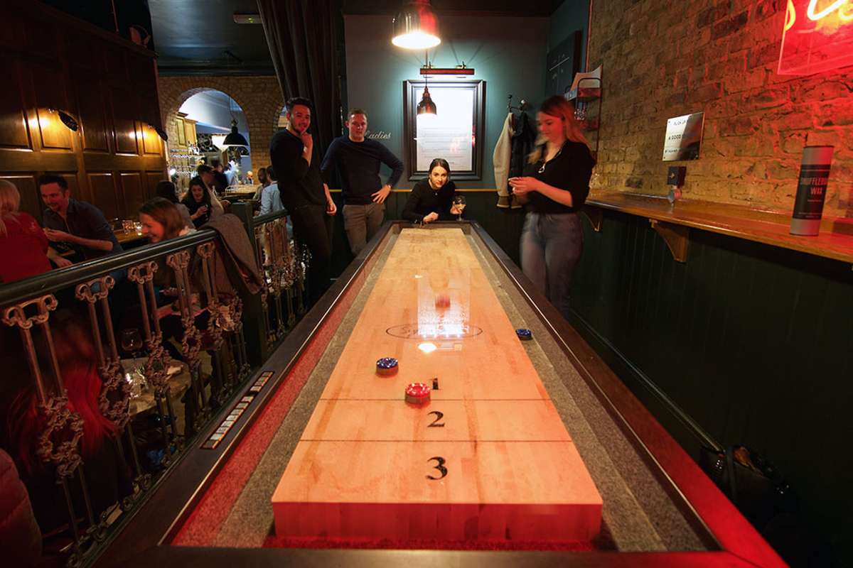 interior-of-the-vine-with-shuffleboard-table-in-the-daytime