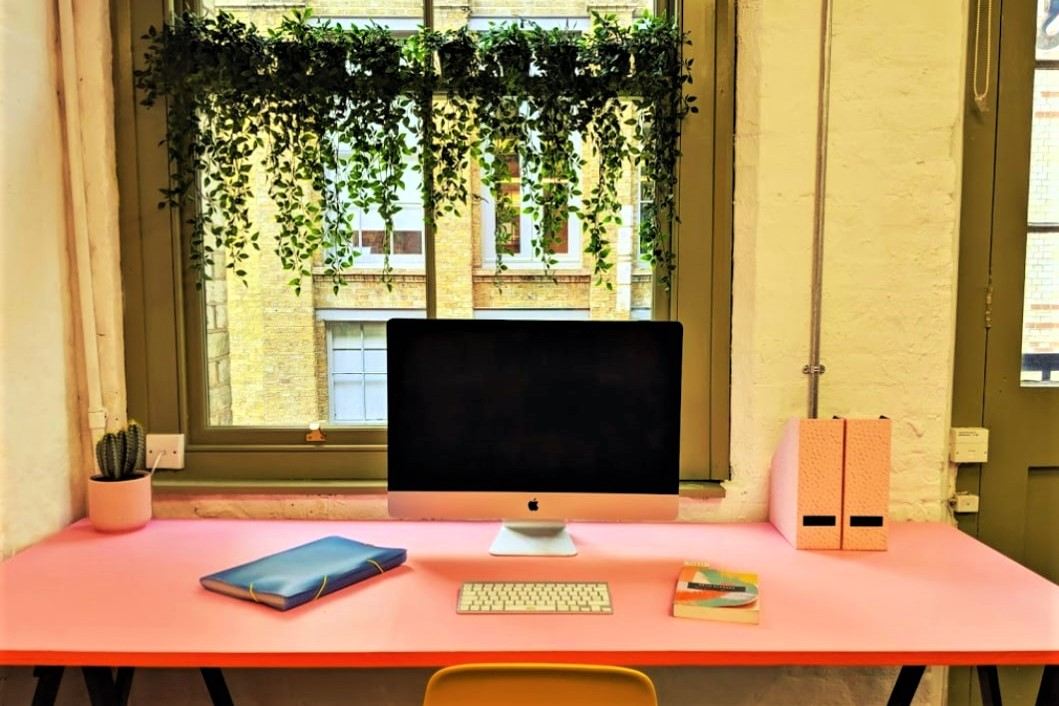 monitor-on-pink-desk-inside-CHROMAWORKS