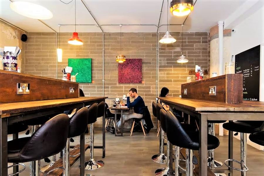 people-working-at-desks-inside-the-brew-eagle-house