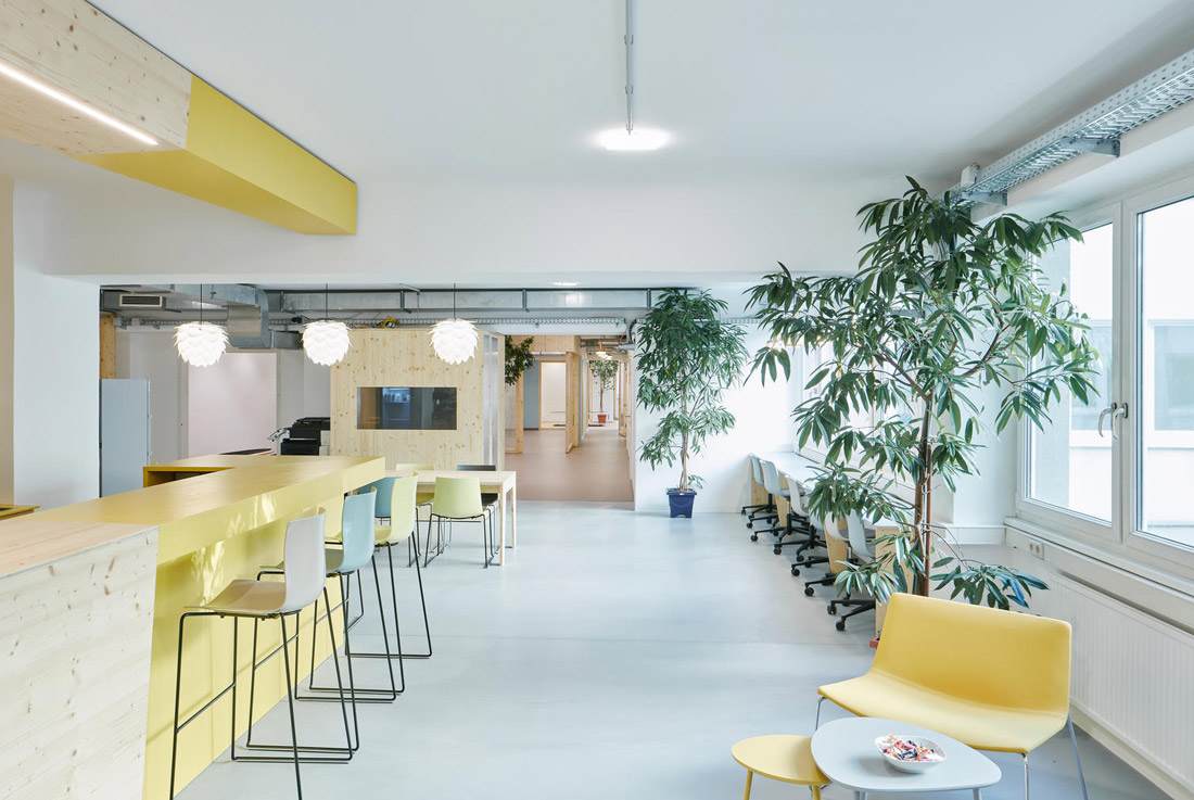 bar-and-tables-inside-brains-and-bodies-coworking