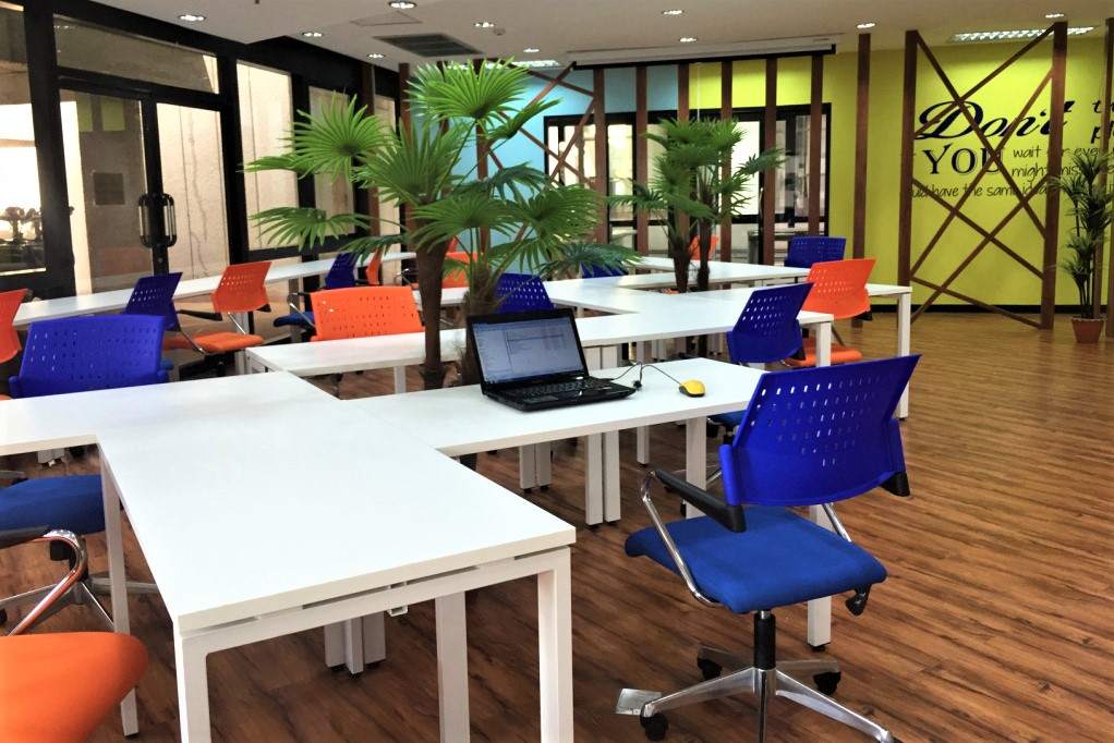 desks-and-colourful-chairs-inside-bigwork