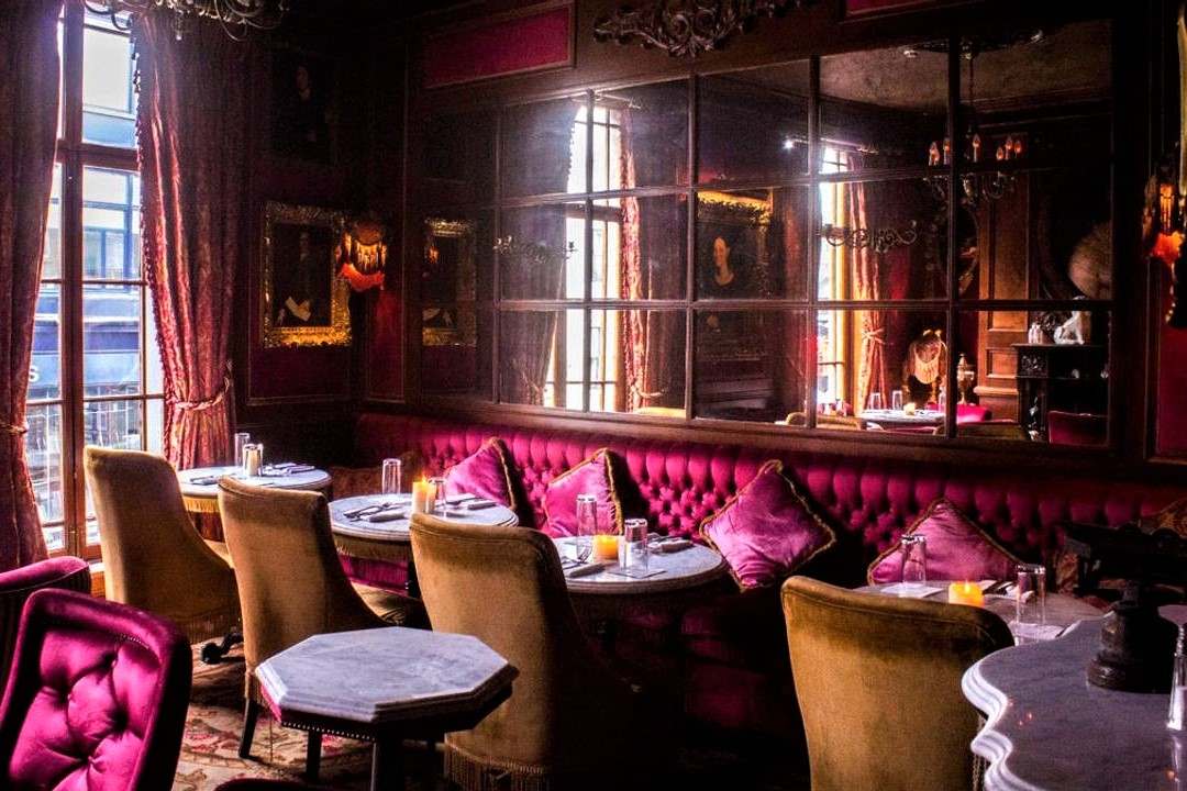 pink-tables-inside-peruke-and-periwig-in-daytime