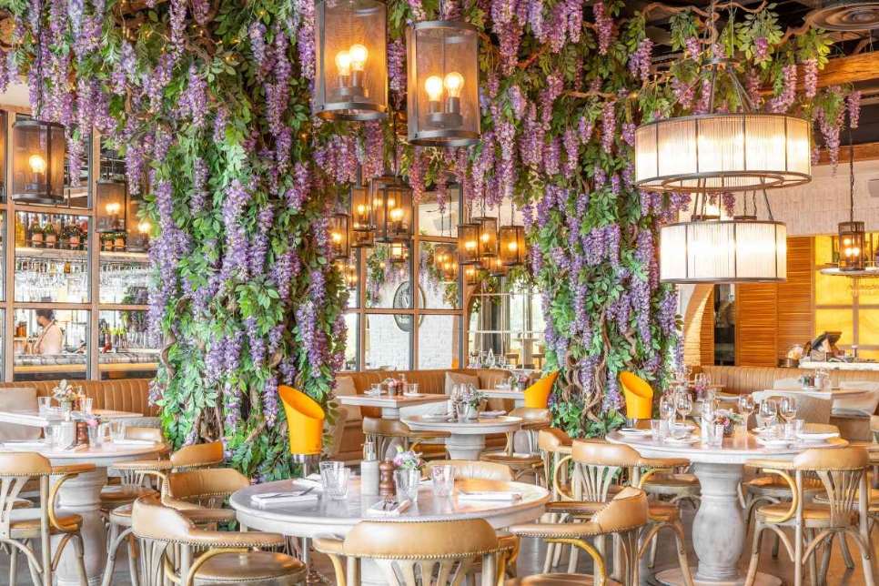 wisteria-and-tables-inside-victors-restaurant-date-ideas-oxford