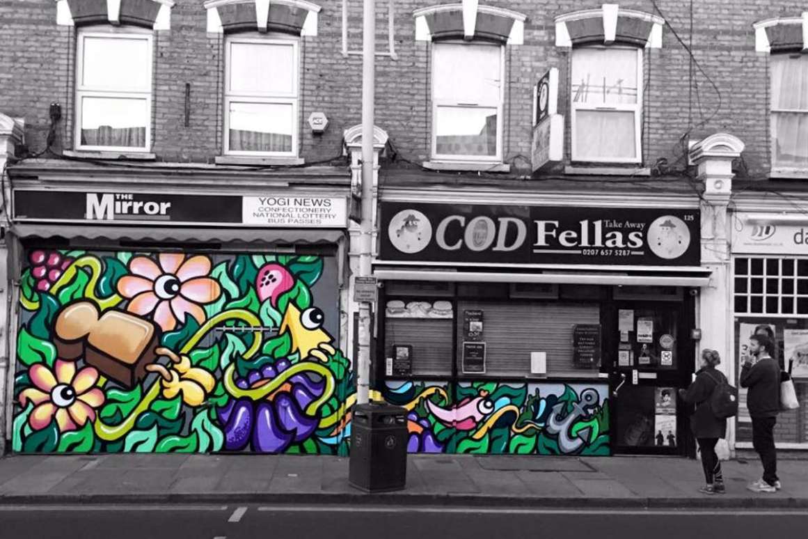 exterior-of-codfellas-in-the-daytime-in-black-and-white-with-coloured-graffiti