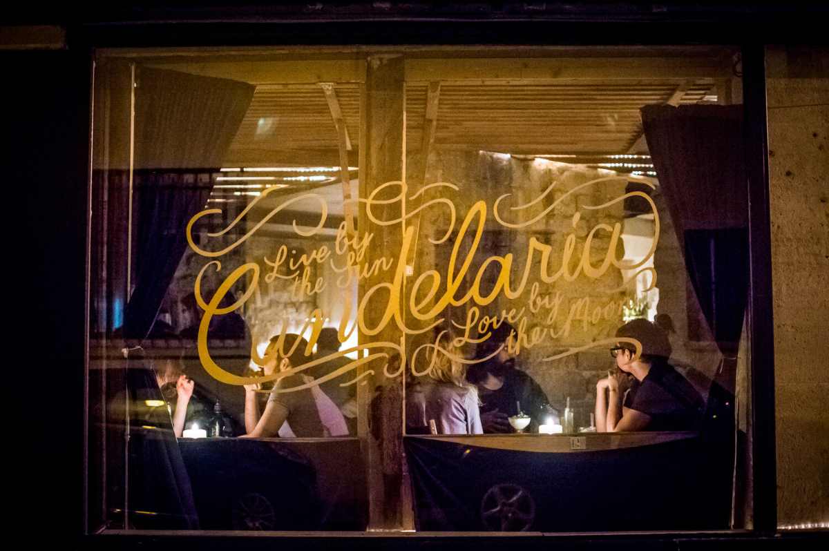 sign-outside-candelaria-bar-at-night