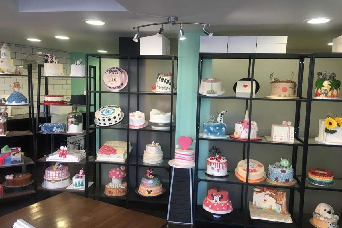 cakes-on-shelves-inside-glutopia-bakery-in-the-daytime
