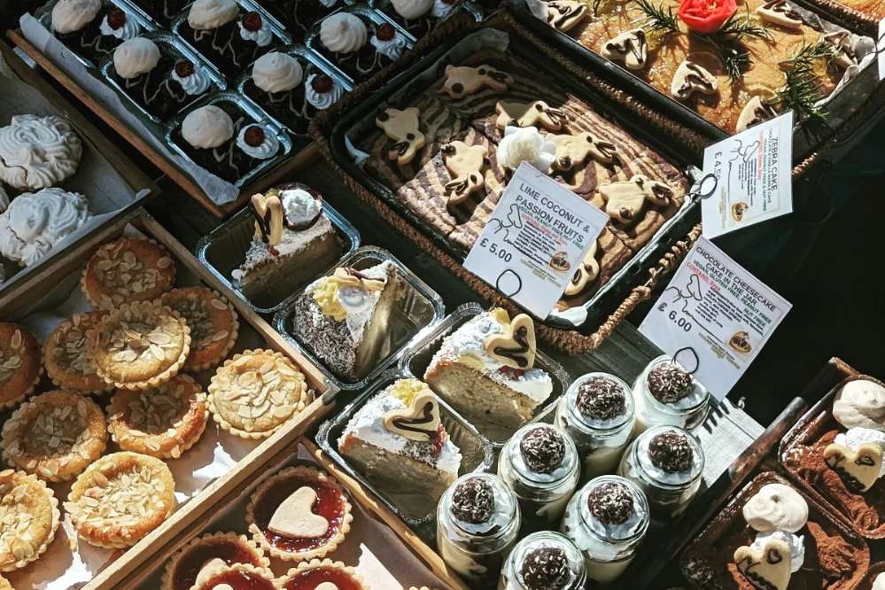 selection-of-cakes-on-stand-at-vegan-sweet-tooth
