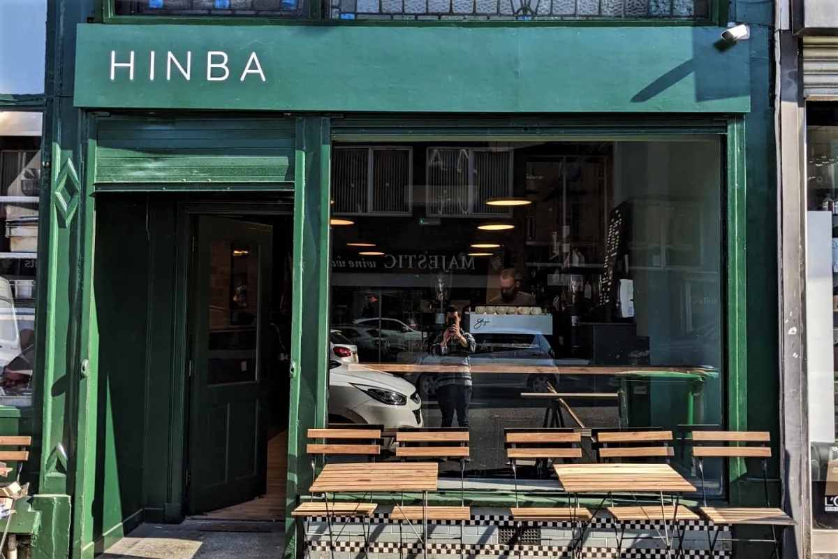 green-exterior-of-hinba-coffee-roasters-in-daytime