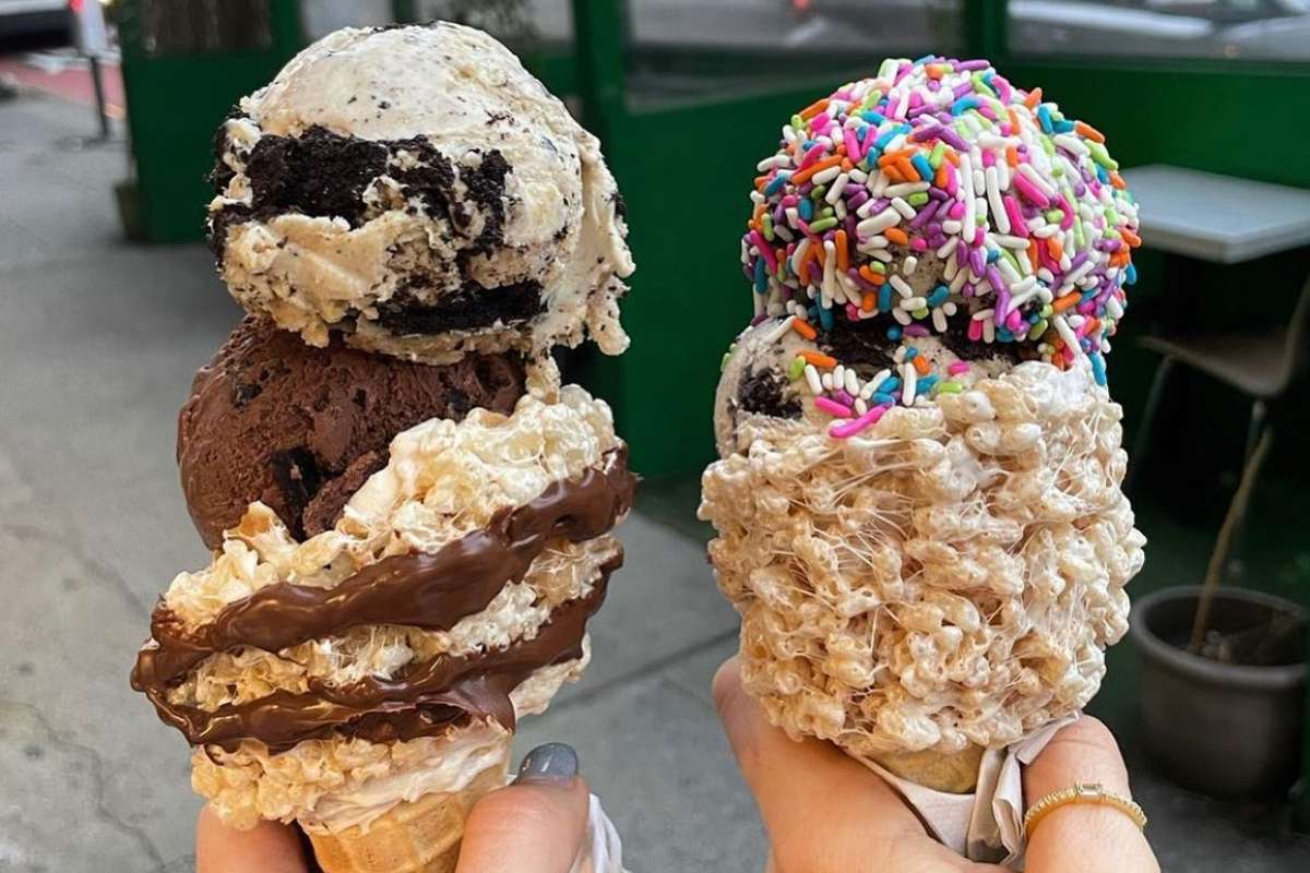 two-ice-cream-cones-in-hand-from-emack-and-bolios