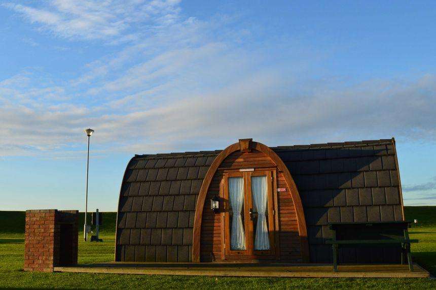 exterior-of-pod-at-skegness-water-leisure-park-timber-pods-in-the-daytime