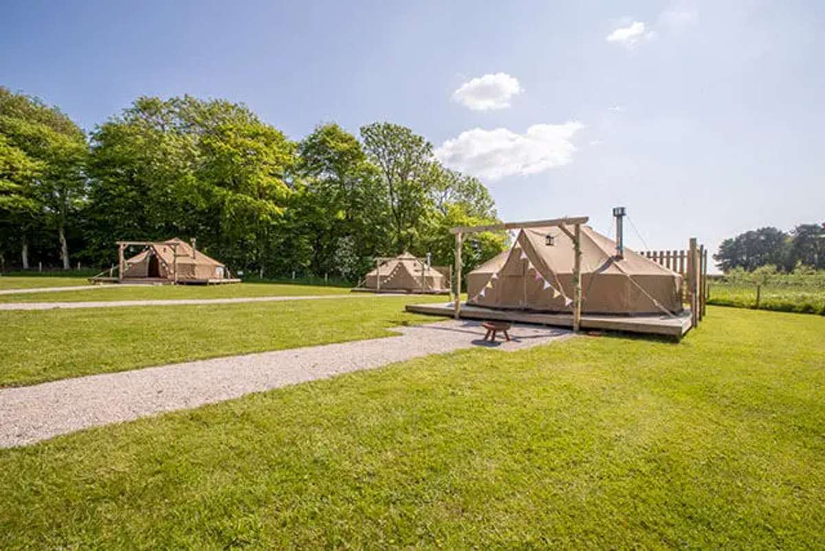 exterior-of-the-tents-at-stanley-villa-farm-bell-tents-in-the-daytime